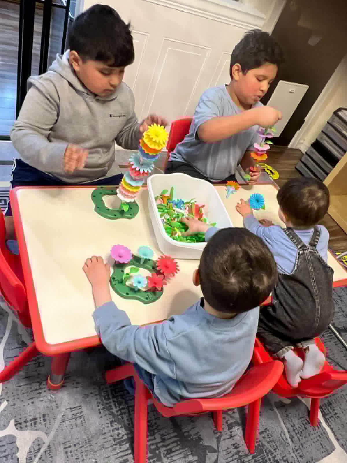 Happy children learning and playing at WonderWorld Kids Child Care in Covington, WA
